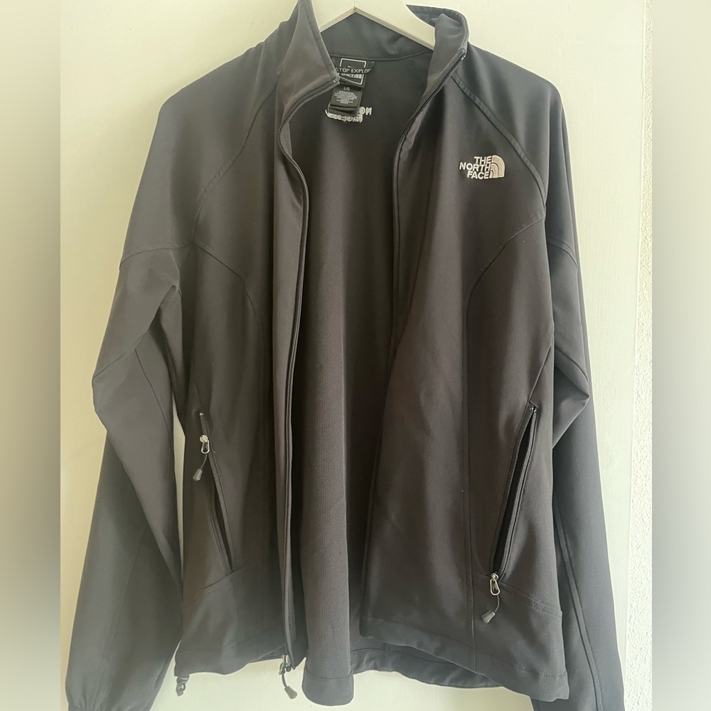 Lightweight black The North Face ladies jacket. Excellent condition
